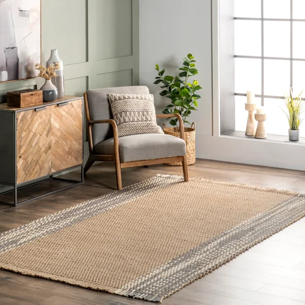 Handwoven striped jute rug with fringe