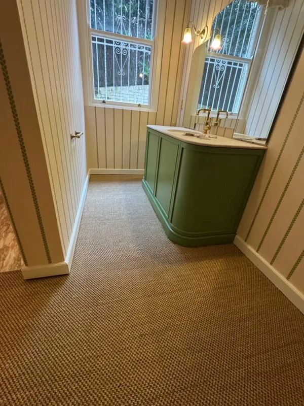 Textured sisal carpet flooring in hallway